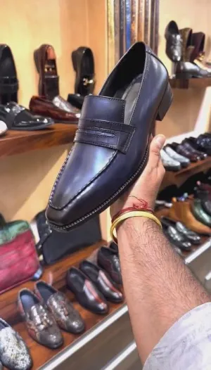 Hand-polished dark purple loafers